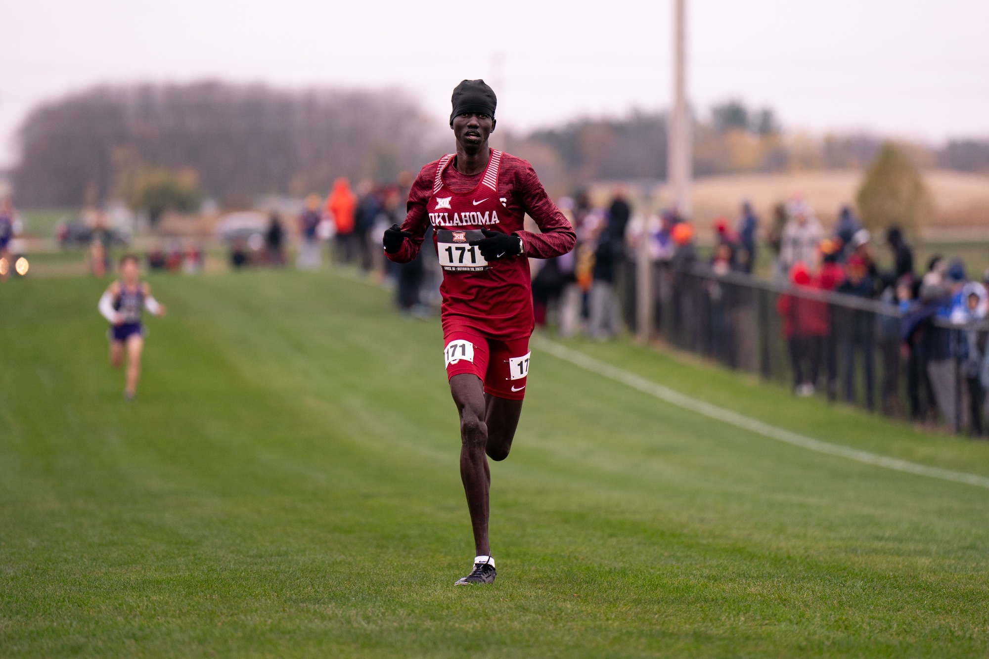 Peter representing the University of Oklahoma in a cross-country running event. 